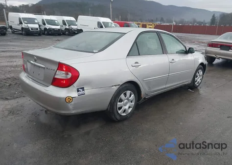 2003 Toyota Camry Le from USA, damaged, VIN 4T1BE30K03U670413